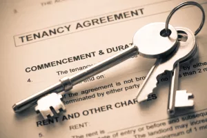 set of keys on top of tenancy agreement