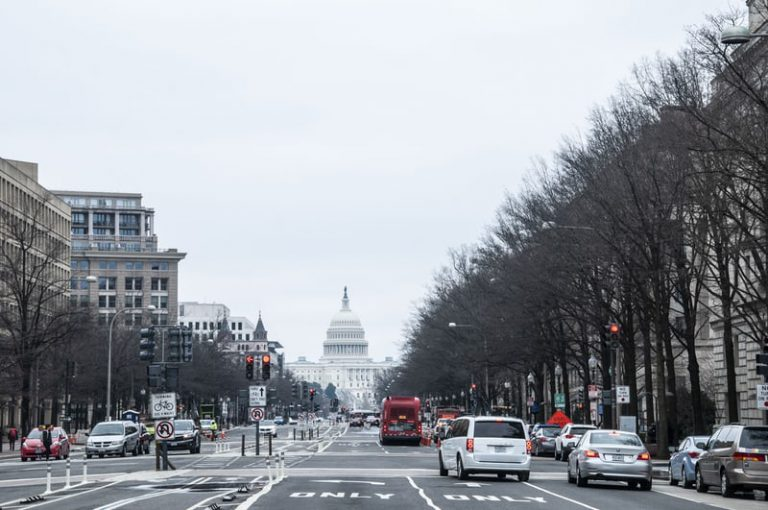 street scene with U.S. Capitol in the distance